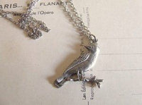 silver songbird necklace